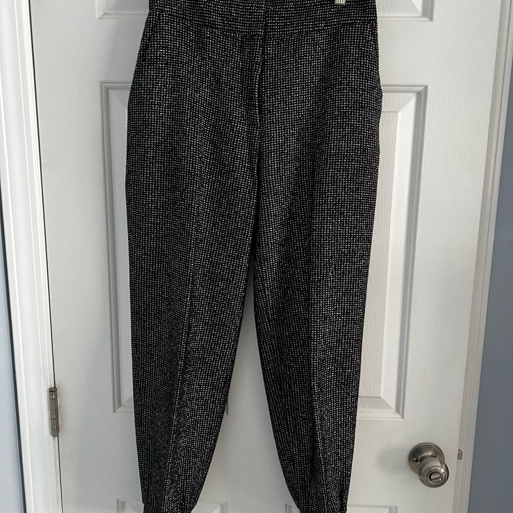 Jogger style contemporary pant with slash pockets.